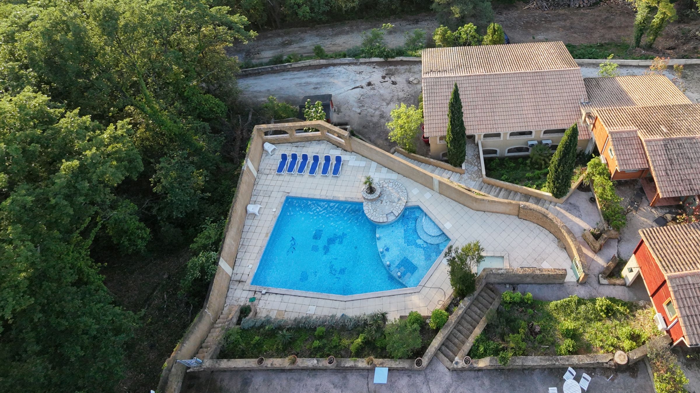 Aerial view of La Pousterle de Sabran, a village of 18 holiday cottages in the Gard: chalets, apartments and pool